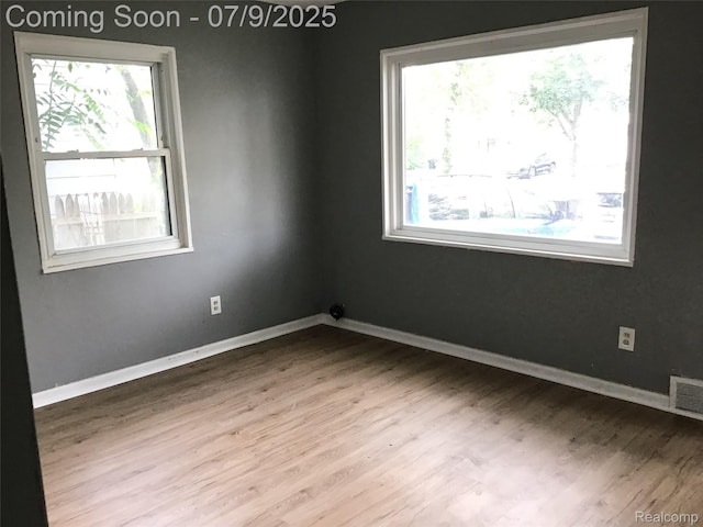 19611 W Chicago St, Detroit, MI 48228 - spare room with wood finished floors and baseboards