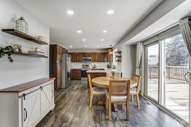 dining space featuring dark wood-type flooring