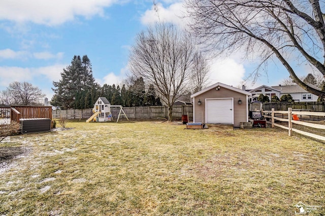 view of yard featuring a playground and a shed