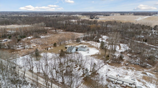 snowy aerial view with a rural view