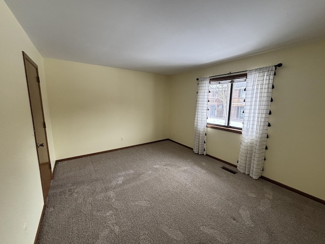 empty room with carpet floors