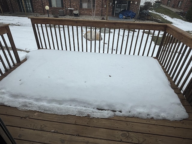 view of snow covered deck