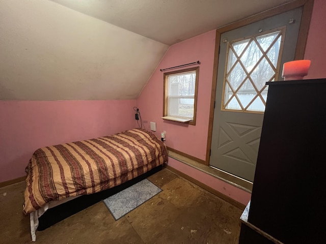 bedroom featuring vaulted ceiling