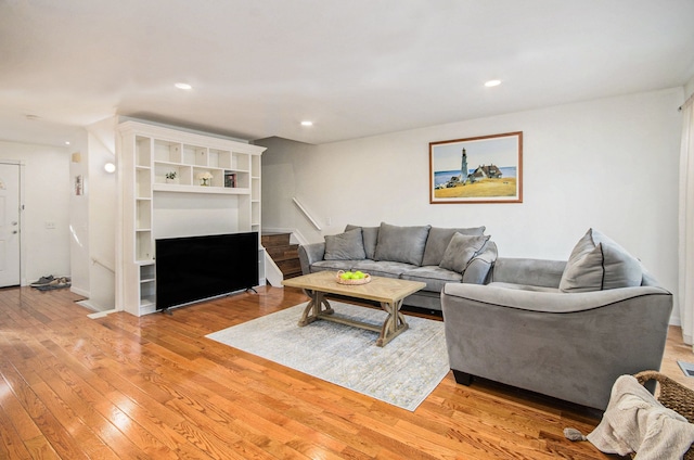 living room with light hardwood / wood-style flooring