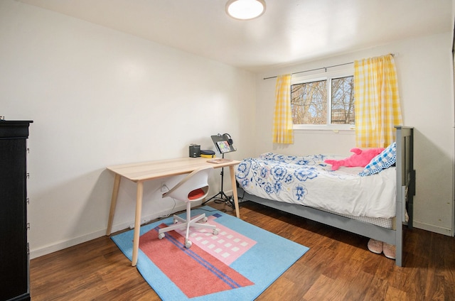 bedroom featuring dark hardwood / wood-style floors