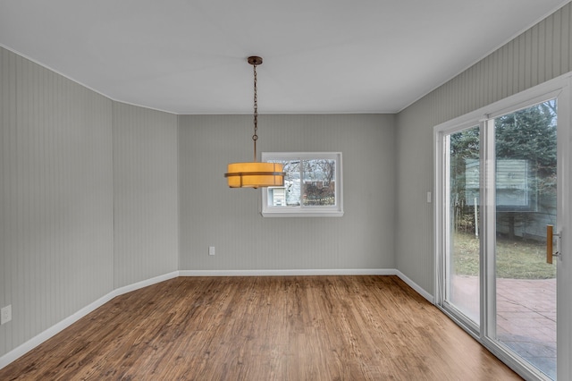 unfurnished dining area with hardwood / wood-style floors