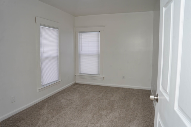 empty room with carpet floors