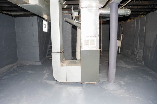 basement featuring heating unit