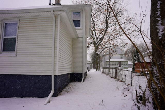 view of snow covered property