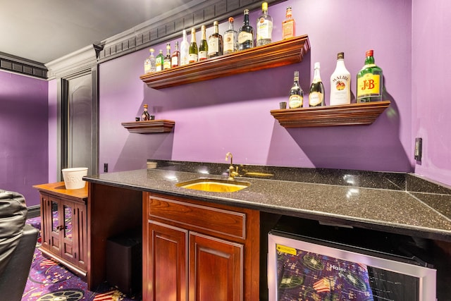 bar with sink and wine cooler