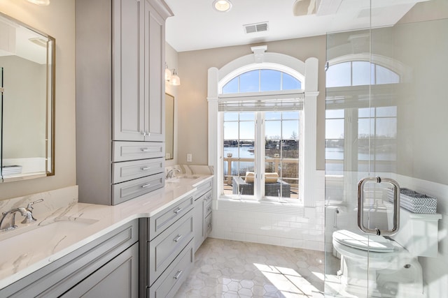 bathroom featuring vanity and tile patterned flooring