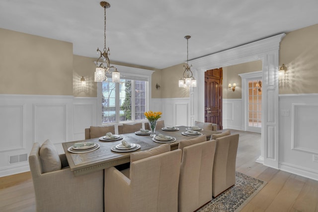 dining room with light hardwood / wood-style flooring