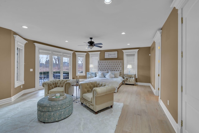 bedroom with crown molding, access to exterior, ceiling fan, and light hardwood / wood-style flooring