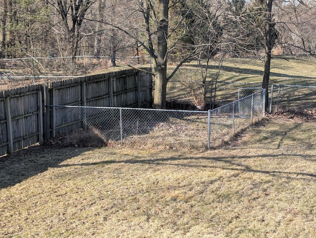 view of yard featuring fence