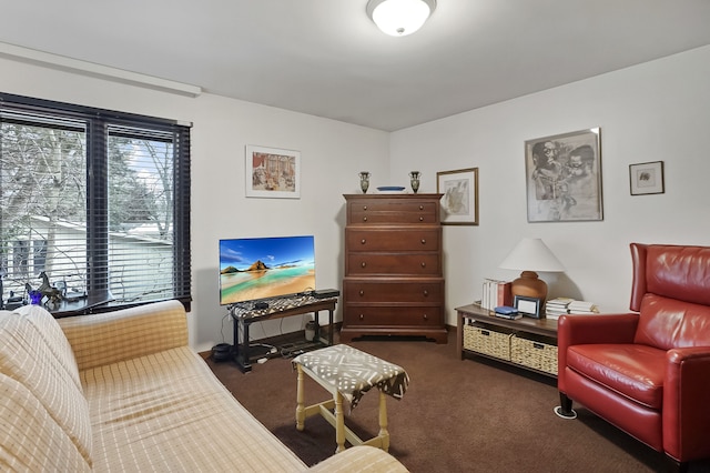 living room featuring plenty of natural light and dark carpet