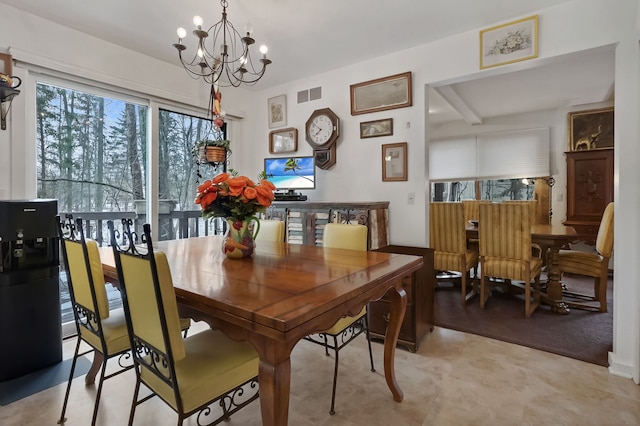 dining room featuring an inviting chandelier