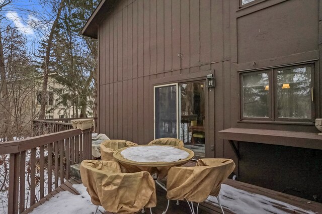 view of snow covered deck