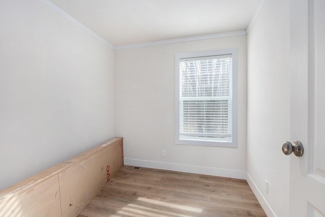 16715 Williamsville St, Vandalia, MI 49095 - unfurnished room with ornamental molding and light wood-type flooring