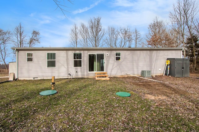 16715 Williamsville St, Vandalia, MI 49095 - rear view of property with a yard and cooling unit