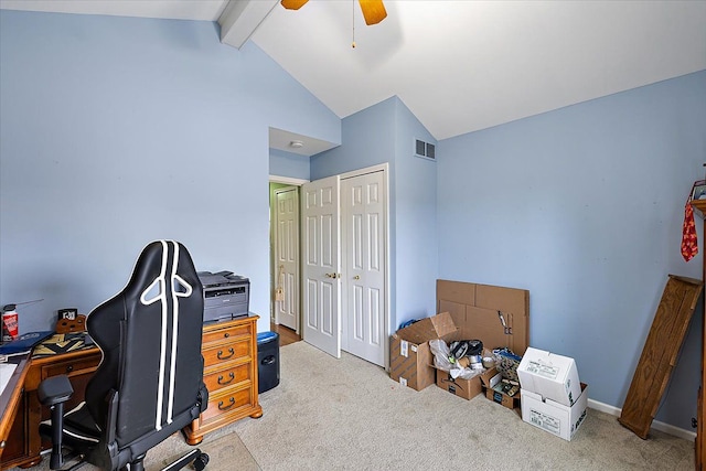 carpeted office space with vaulted ceiling with beams and ceiling fan