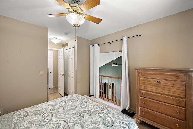 bedroom with a closet and ceiling fan