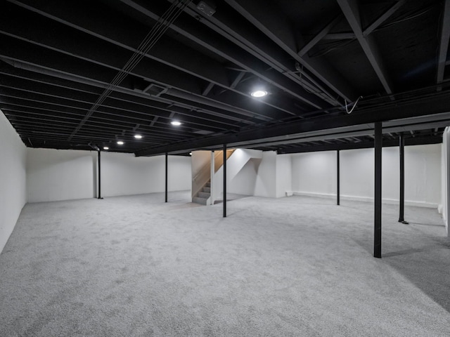 basement with carpet flooring