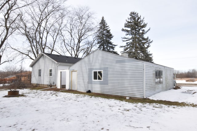 view of snow covered property