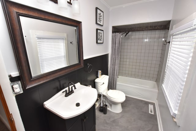 full bathroom featuring shower / tub combo, vanity, tile walls, and toilet