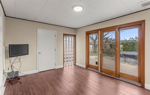 interior space with hardwood / wood-style flooring