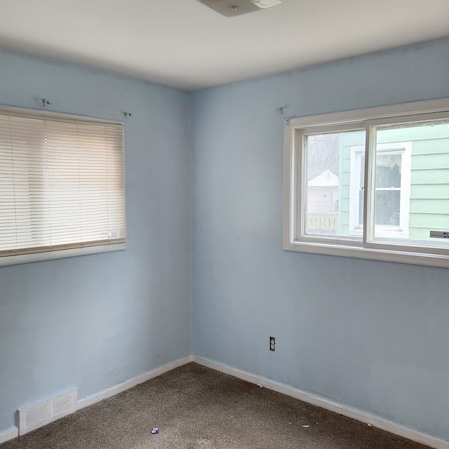 empty room with carpet floors