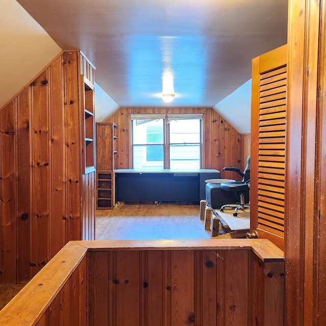 bonus room featuring vaulted ceiling