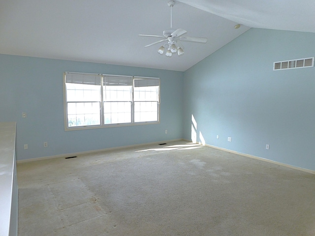 spare room with lofted ceiling and ceiling fan