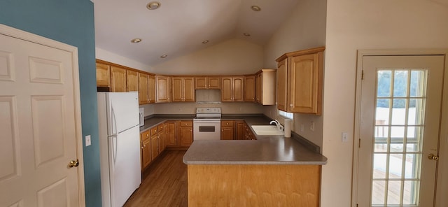 kitchen featuring white appliances, wood-type flooring, high vaulted ceiling, and sink