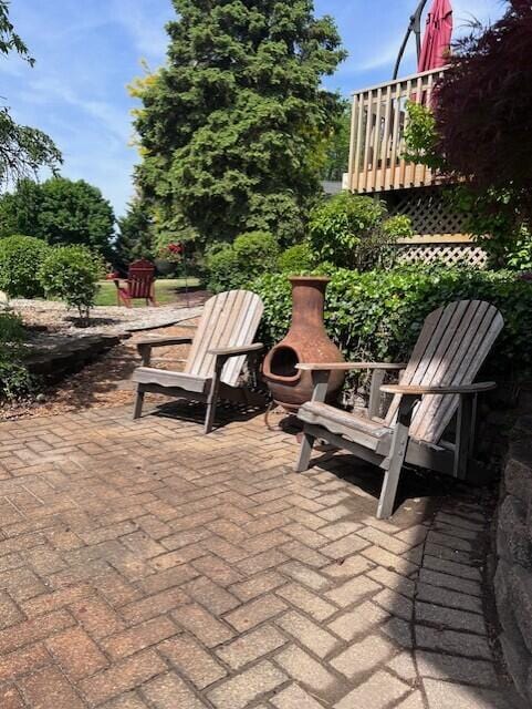 view of property's community featuring a patio