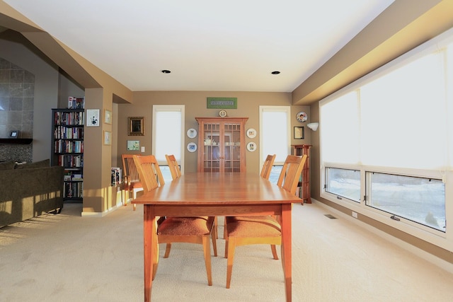 dining area with light carpet