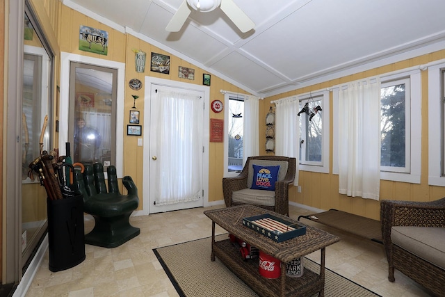 sitting room with lofted ceiling and ceiling fan