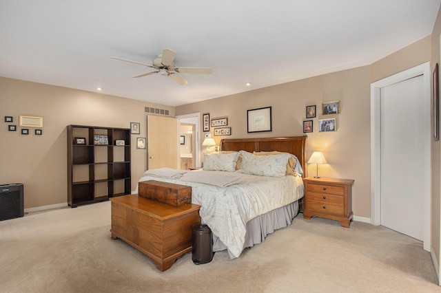 carpeted bedroom with ceiling fan