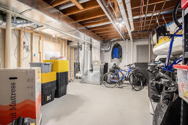 basement featuring heating unit