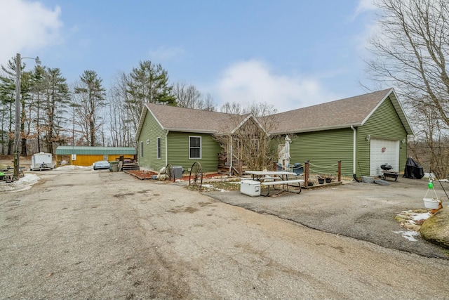 exterior space with a garage