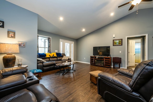 living room with high vaulted ceiling, dark hardwood / wood-style floors, and ceiling fan