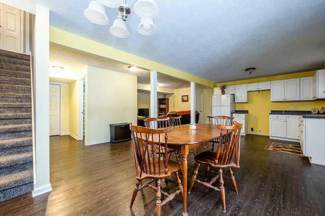 dining room featuring dark hardwood / wood-style floors