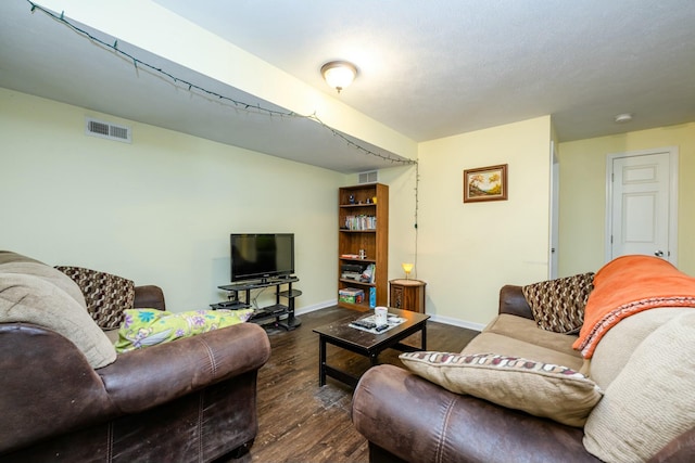 living room featuring dark hardwood / wood-style flooring