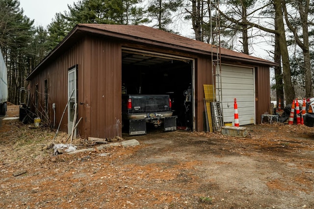 view of outdoor structure featuring a garage