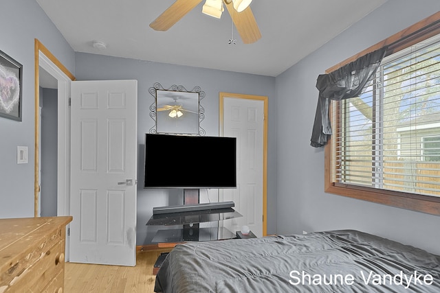 bedroom featuring hardwood / wood-style flooring and ceiling fan