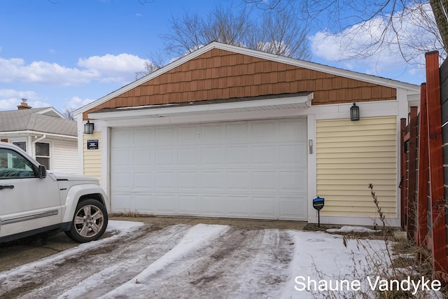 view of snow covered garage