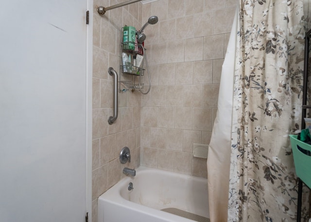 bathroom featuring shower / bathtub combination with curtain