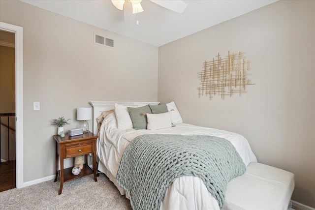 bedroom with ceiling fan and carpet