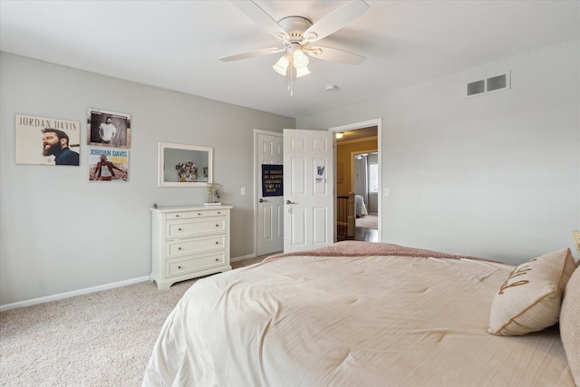 bedroom with light carpet and ceiling fan