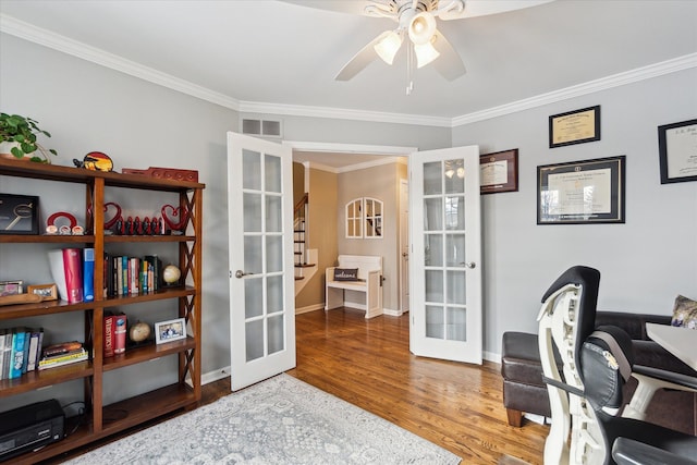 home office with wood-type flooring, ceiling fan, crown molding, and french doors