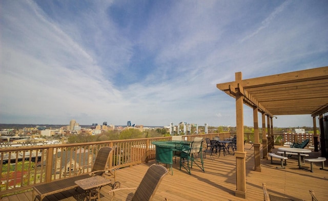 wooden terrace with a pergola